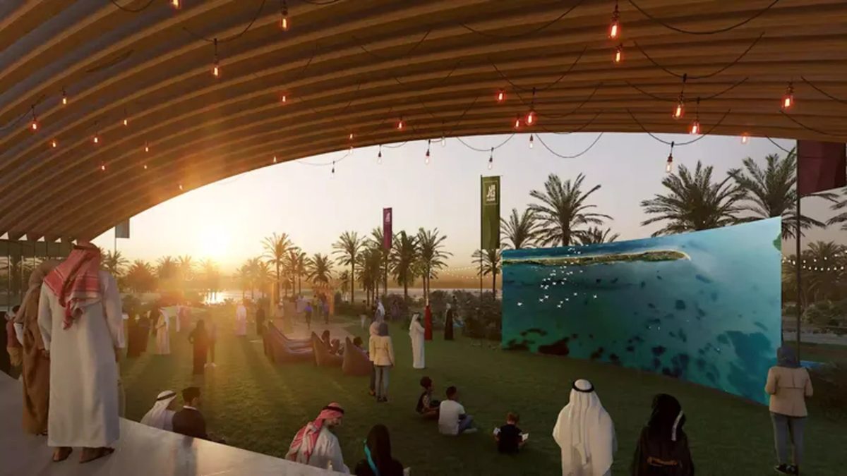 The outdoor cinema at Saadiyat Lagoons at sunset under a curved timber canopy