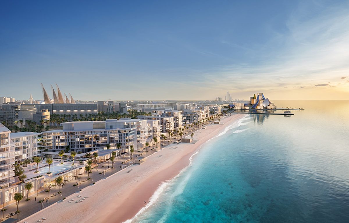Mamsha Al Saadiyat: the curve of the beach with the low-rise buildings along it, as rendered by Aldar